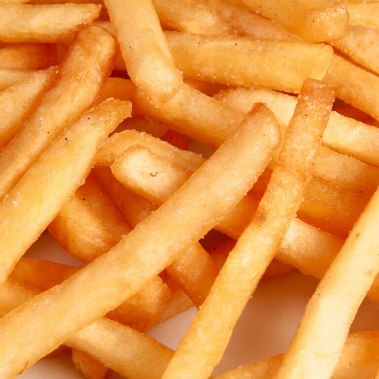 Close-up of crispy golden French fries.